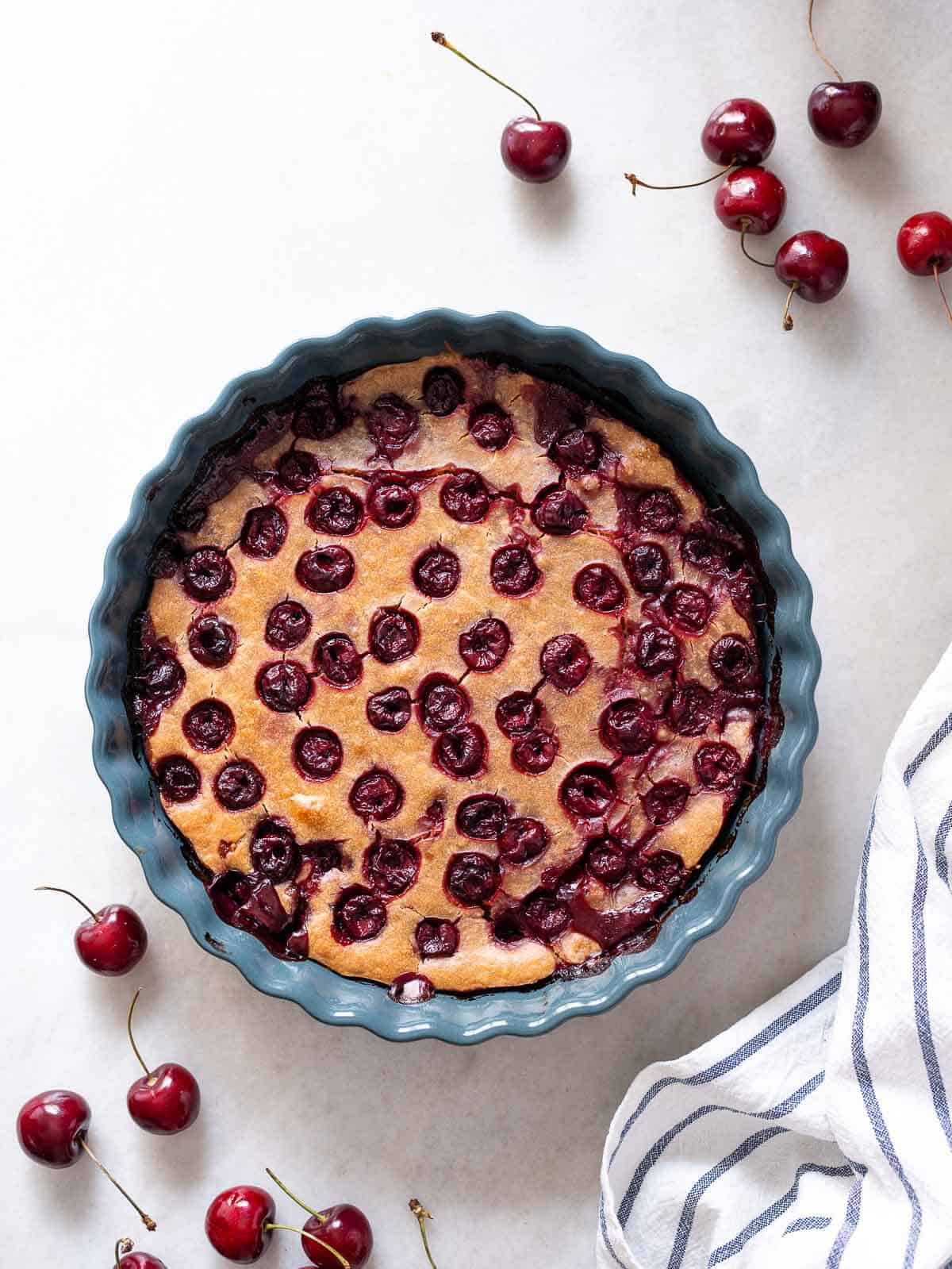 Top View of Baked Vegan Sherry Pie - The whole pie baked, with cherries on top and a golden-brown finish.