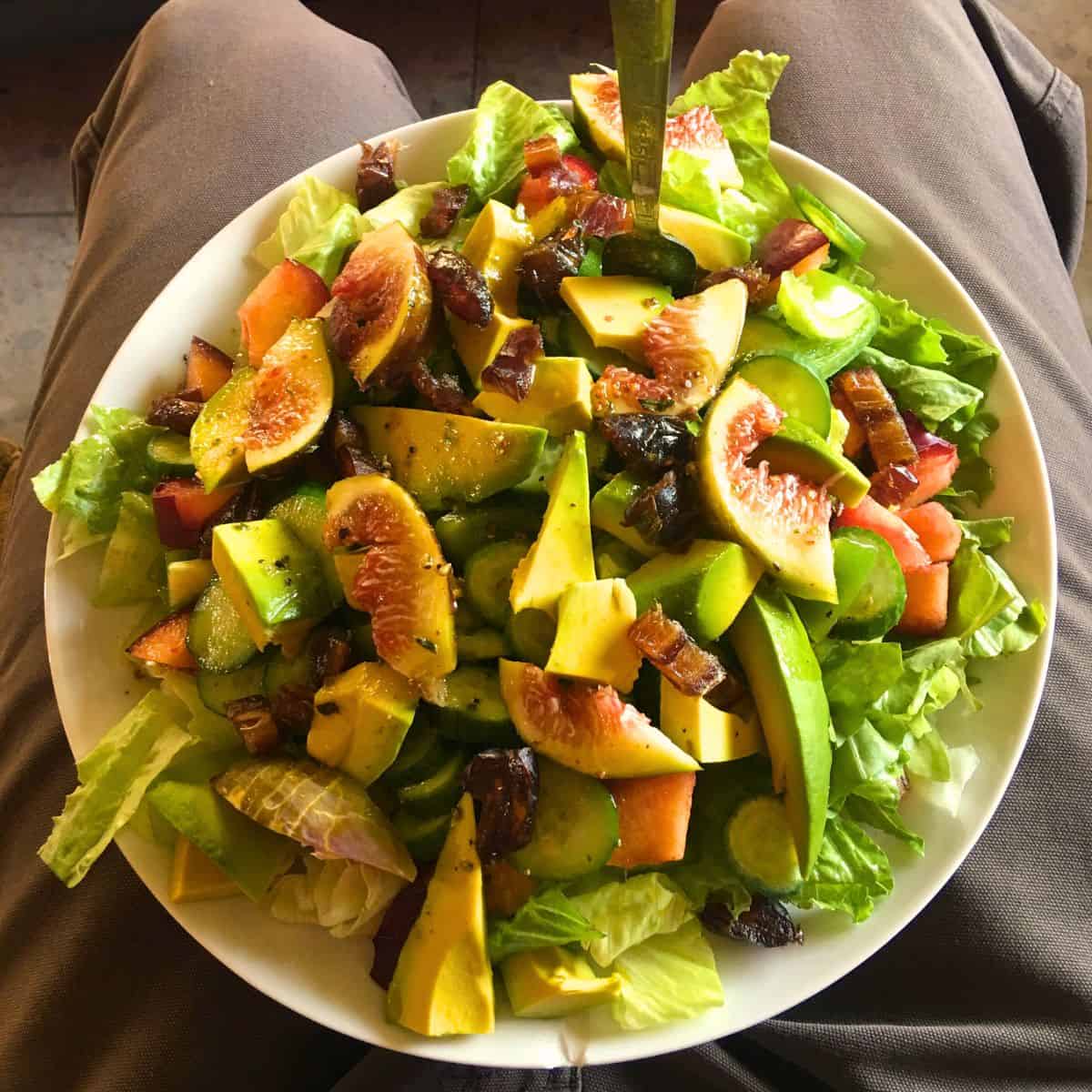 fresh figs and avocado salad with spicy arugula