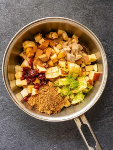 saucepan with all the apple empanadas filling ingredients, ready to be cooked.