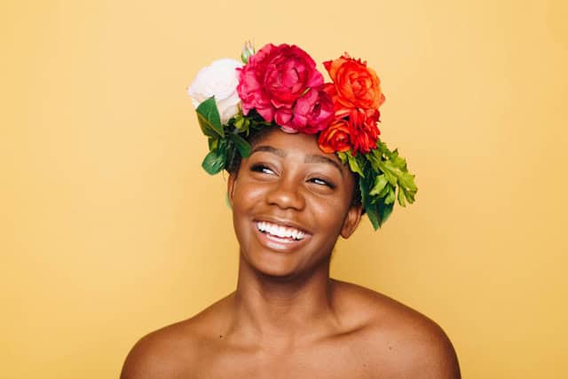 Natural girl with flower on head