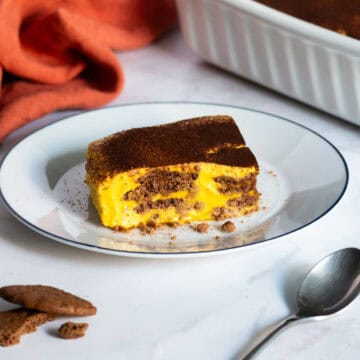 chocolate pumpkin cake portion on a serving plate.