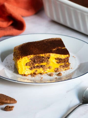 chocolate pumpkin cake portion on a serving plate.