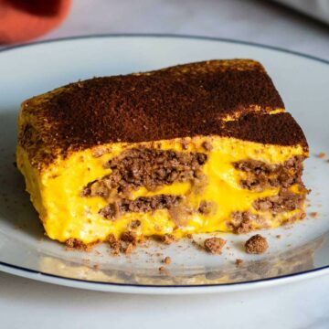 chocolate pumpkin cake portion on a serving plate.