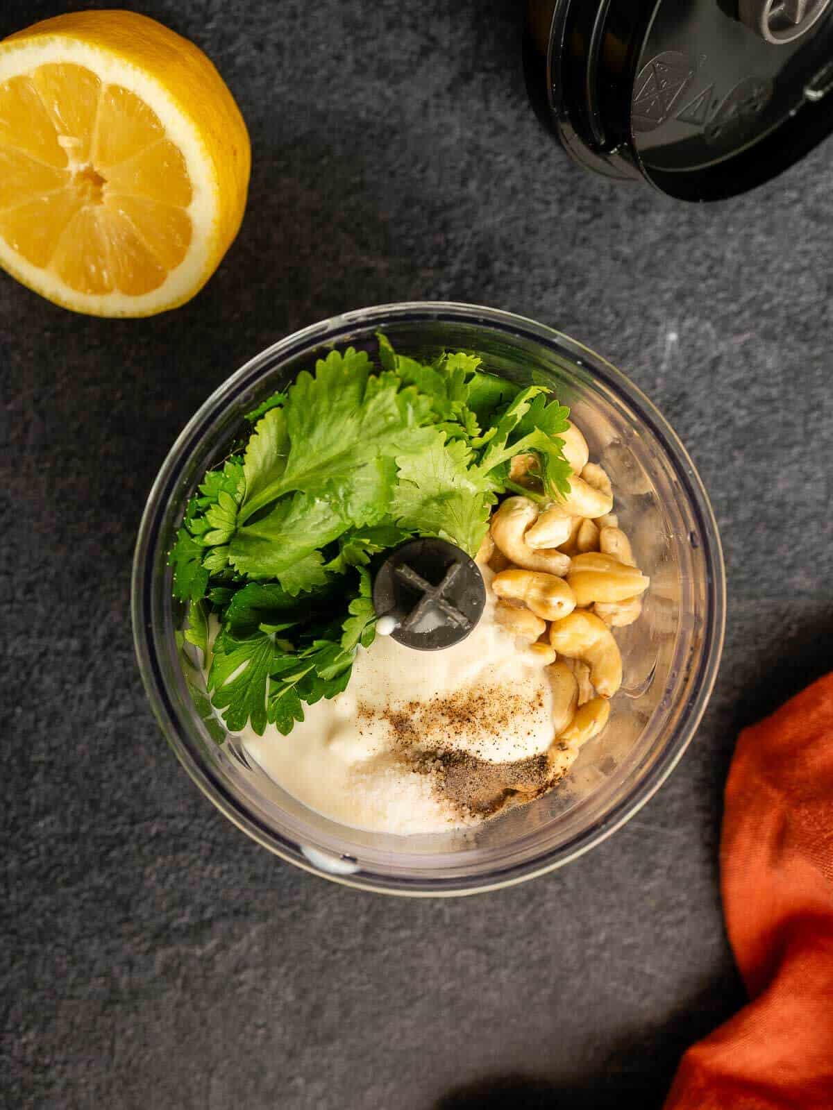 all ingredients for the dressing in a food processor container.